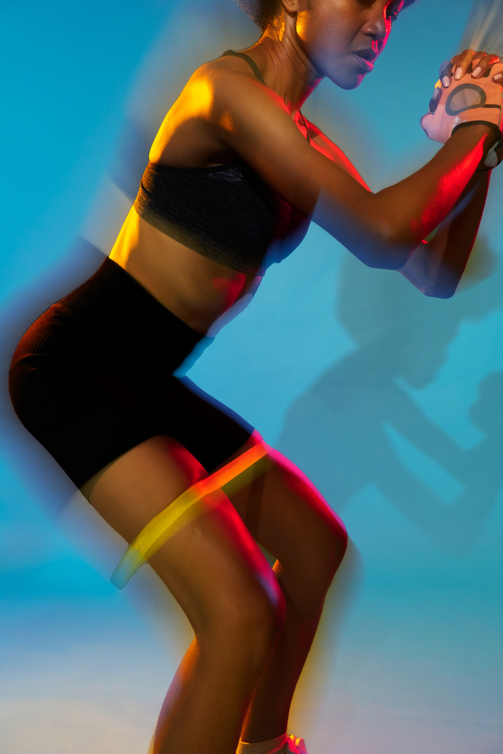 Portrait of a Woman Exercising with Resistance Bands